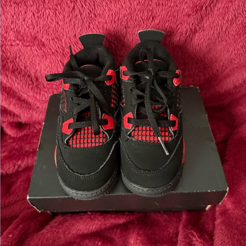 Dynamic Black and Red Athletic Sneakers with Mesh Overlays Jordan
